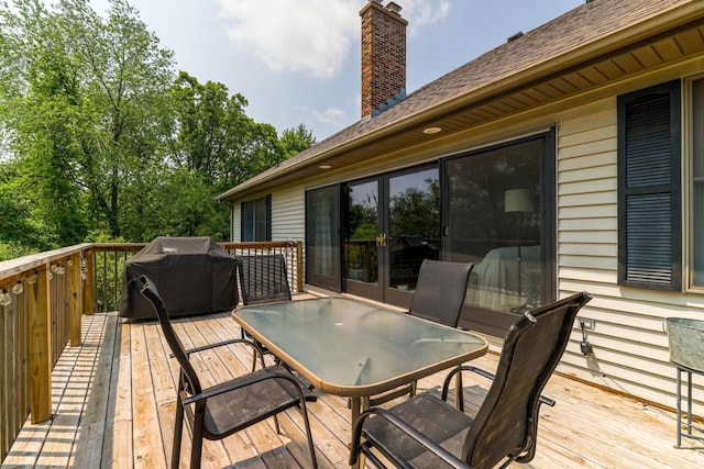 3250 Wild Turkey Ln, Red Wing, MN 55066 - deck featuring outdoor dining area, a grill, and french doors