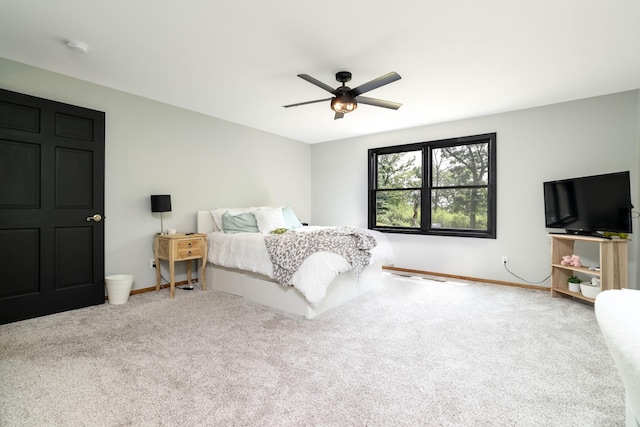 3250 Wild Turkey Ln, Red Wing, MN 55066 - carpeted bedroom featuring a ceiling fan and baseboards