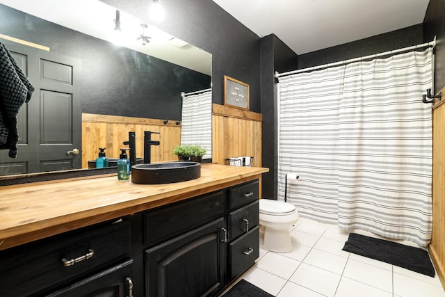 3250 Wild Turkey Ln, Red Wing, MN 55066 - full bathroom featuring a textured wall, vanity, tile patterned flooring, and curtained shower