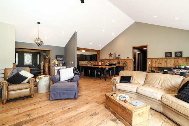 3250 Wild Turkey Ln, Red Wing, MN 55066 - living room with high vaulted ceiling, light wood-style flooring, recessed lighting, and a chandelier