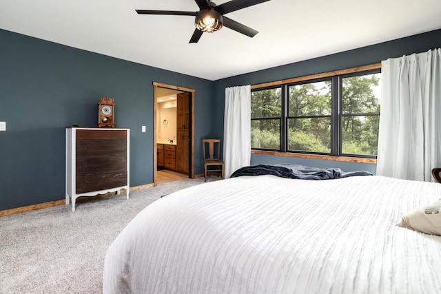 3250 Wild Turkey Ln, Red Wing, MN 55066 - carpeted bedroom with ceiling fan and ensuite bathroom