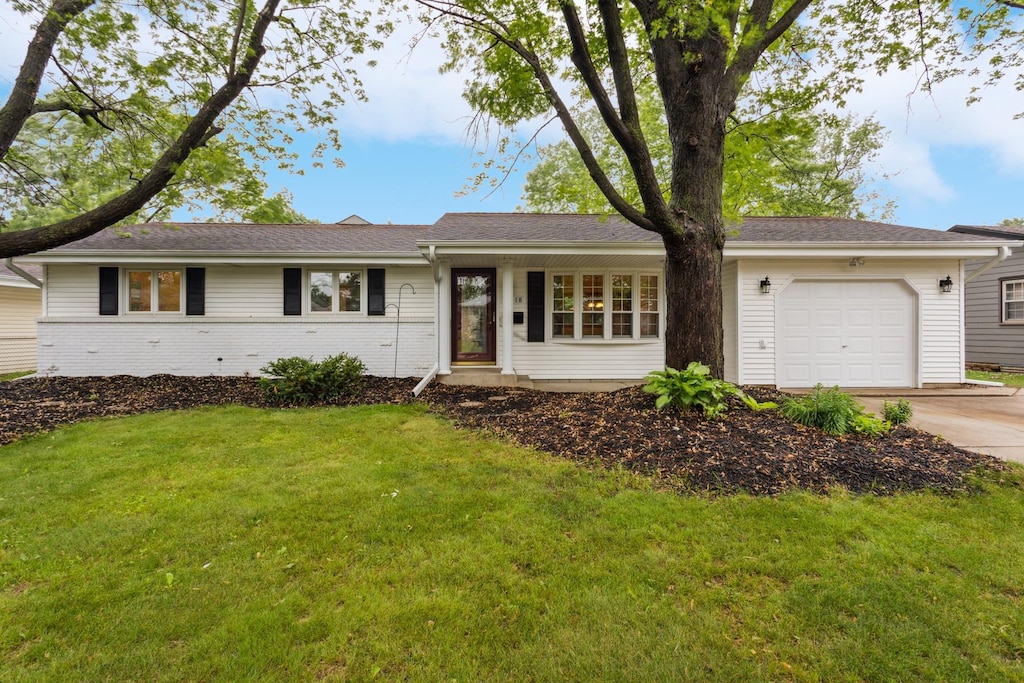 8818 18th Ave S, Bloomington, MN 55425 - ranch-style home with driveway, a garage, a front yard, and brick siding