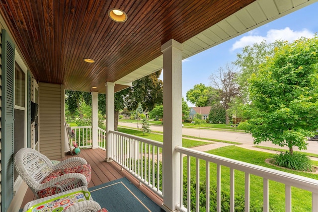 5718 13th Ave S, Minneapolis, MN 55417 - wooden porch with a lawn