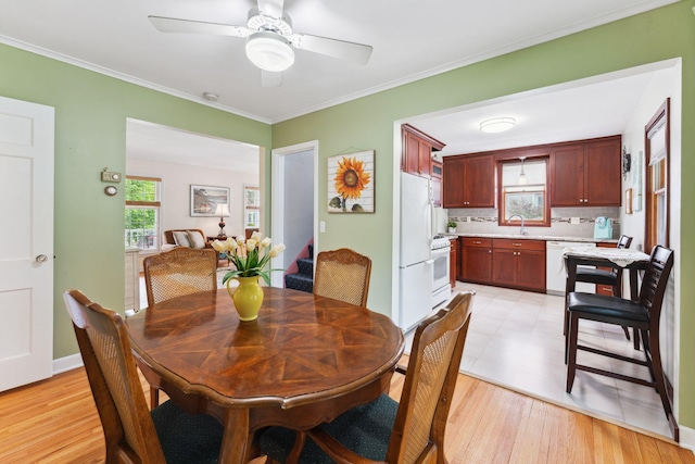 5718 13th Ave S, Minneapolis, MN 55417 - dining area with a ceiling fan, light wood-style flooring, and ornamental molding