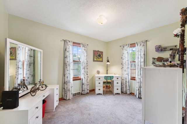 5718 13th Ave S, Minneapolis, MN 55417 - bedroom featuring light carpet, an office area, baseboards, and a textured ceiling