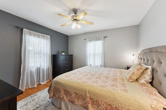 5718 13th Ave S, Minneapolis, MN 55417 - bedroom featuring light wood-style floors and ceiling fan