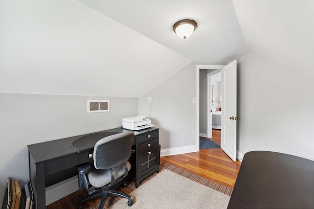 5718 13th Ave S, Minneapolis, MN 55417 - home office with wood finished floors, vaulted ceiling, and baseboards