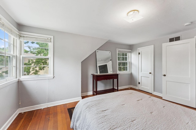 5718 13th Ave S, Minneapolis, MN 55417 - bedroom with baseboards and hardwood / wood-style flooring