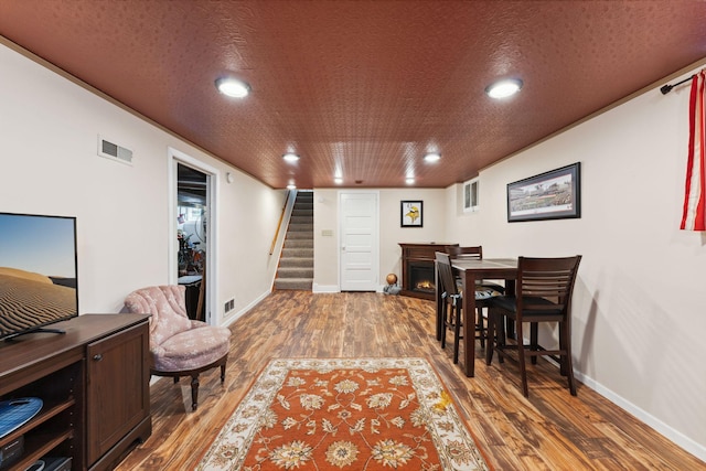 5718 13th Ave S, Minneapolis, MN 55417 - office area with wood finished floors, baseboards, recessed lighting, and a warm lit fireplace
