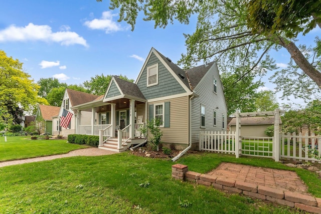 5718 13th Ave S, Minneapolis, MN 55417 - view of front of home featuring a porch and roof with shingles
