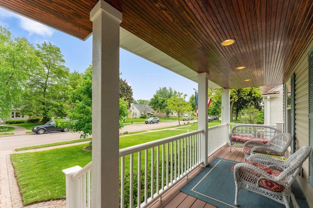 5718 13th Ave S, Minneapolis, MN 55417 - wooden porch featuring a lawn