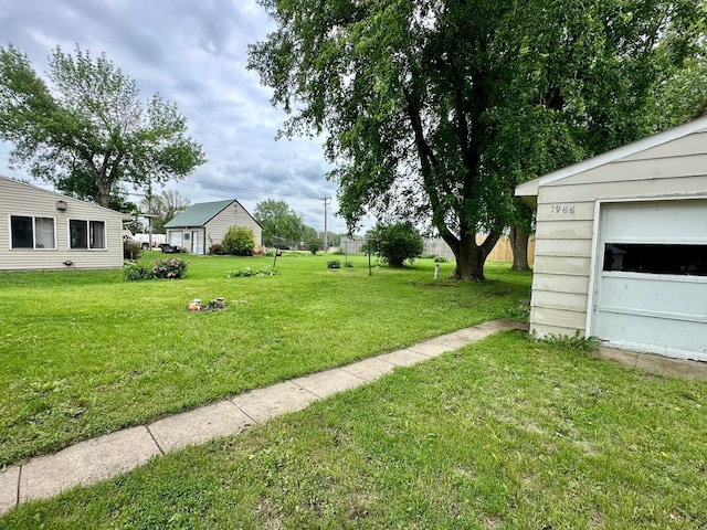 114 Thompson Ave, Rushmore, MN 56168 - view of green lawn with an outbuilding