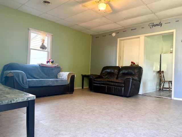 114 Thompson Ave, Rushmore, MN 56168 - living area with a paneled ceiling, a ceiling fan, and tile patterned floors