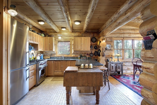 9453 Little Elbow Lk N, Cook, MN 55723 - kitchen with appliances with stainless steel finishes, log walls, a sink, wood ceiling with exposed beams, and dark countertops
