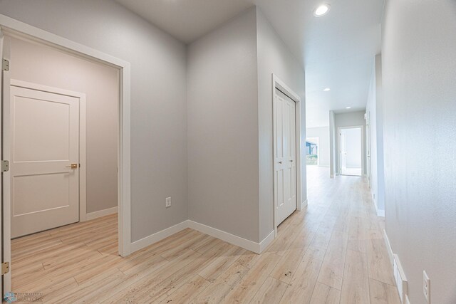 6646 68th St S, Horace, ND 58047 - hallway with light wood-style flooring and recessed lighting