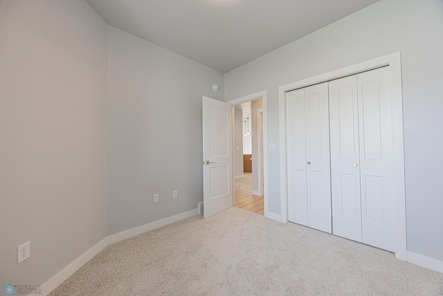 6646 68th St S, Horace, ND 58047 - unfurnished bedroom featuring carpet flooring and a closet