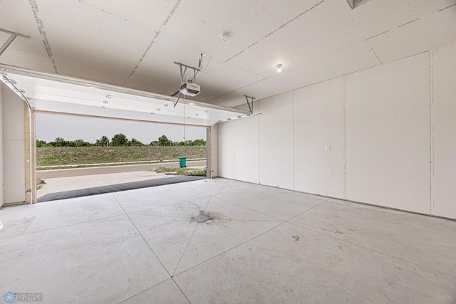 6646 68th St S, Horace, ND 58047 - garage featuring a garage door opener
