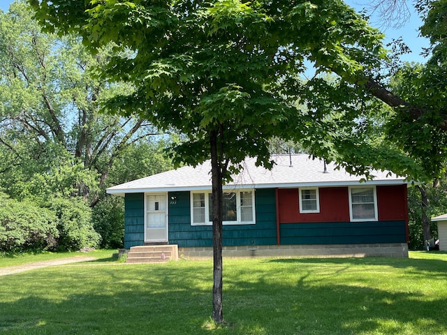 757 111th Ave NW, Coon Rapids, MN 55448 - view of front facade with a front yard and roof with shingles