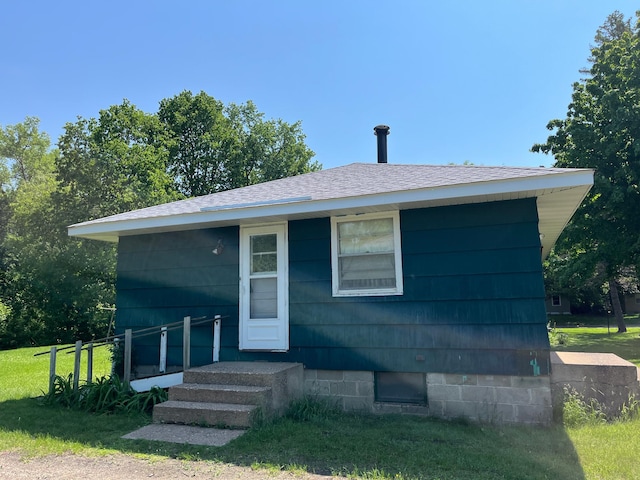 757 111th Ave NW, Coon Rapids, MN 55448 - bungalow-style house with a shingled roof and a front yard