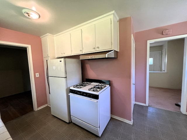 757 111th Ave NW, Coon Rapids, MN 55448 - kitchen featuring white appliances, under cabinet range hood, white cabinetry, dark flooring, and baseboards