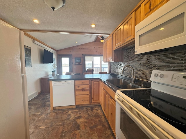 13150 Maple Circle Dr SE, Hudson Twp, MN 56334 - kitchen with white appliances, a sink, a peninsula, vaulted ceiling, and dark countertops