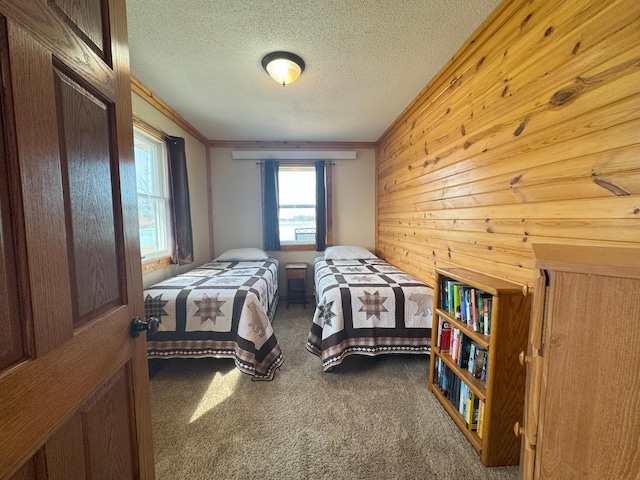 13150 Maple Circle Dr SE, Hudson Twp, MN 56334 - bedroom with carpet floors, crown molding, wood walls, and a textured ceiling