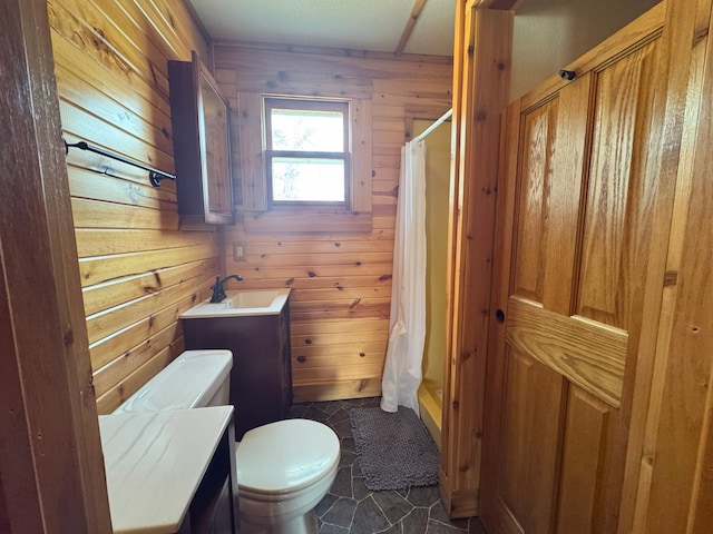 13150 Maple Circle Dr SE, Hudson Twp, MN 56334 - bathroom with toilet, a stall shower, wooden walls, vanity, and tile patterned floors