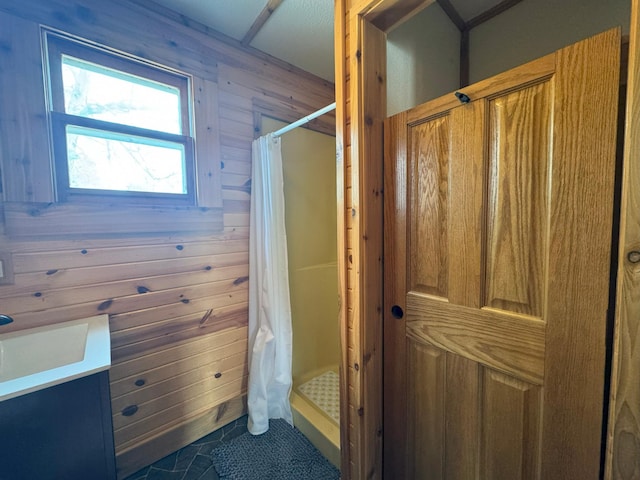 13150 Maple Circle Dr SE, Hudson Twp, MN 56334 - bathroom with a shower stall, vanity, tile patterned floors, and wooden walls