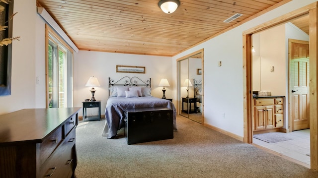 10787 Reynolds Rd, Round Lake Twp, WI 54843 - bedroom with wood ceiling, carpet floors, and baseboards