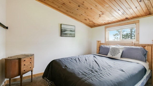 10787 Reynolds Rd, Round Lake Twp, WI 54843 - bedroom with wood ceiling, carpet flooring, and lofted ceiling