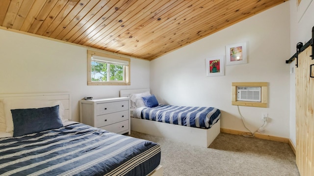 10787 Reynolds Rd, Round Lake Twp, WI 54843 - carpeted bedroom with a barn door, wooden ceiling, vaulted ceiling, a wall unit AC, and baseboards