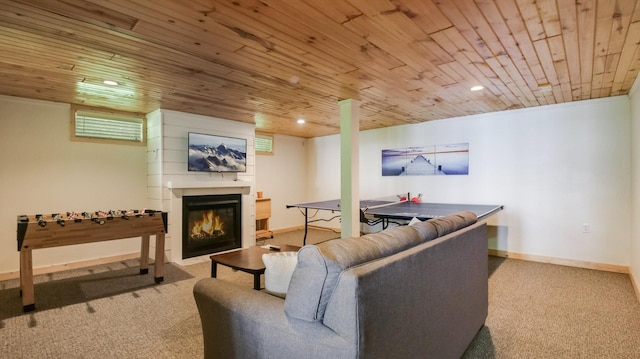 10787 Reynolds Rd, Round Lake Twp, WI 54843 - living room featuring wood ceiling, carpet, a glass covered fireplace, baseboards, and recessed lighting