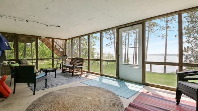 10787 Reynolds Rd, Round Lake Twp, WI 54843 - sunroom with a water view, plenty of natural light, and an outdoor hangout area