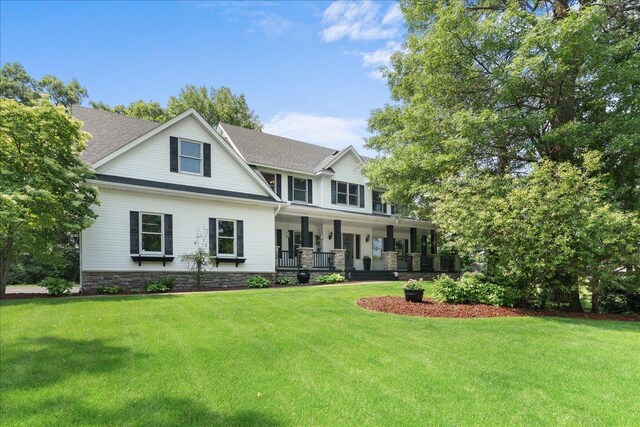 1848 141st Ln NE, Ham Lake, MN 55304 - view of front of property with covered porch and a front yard