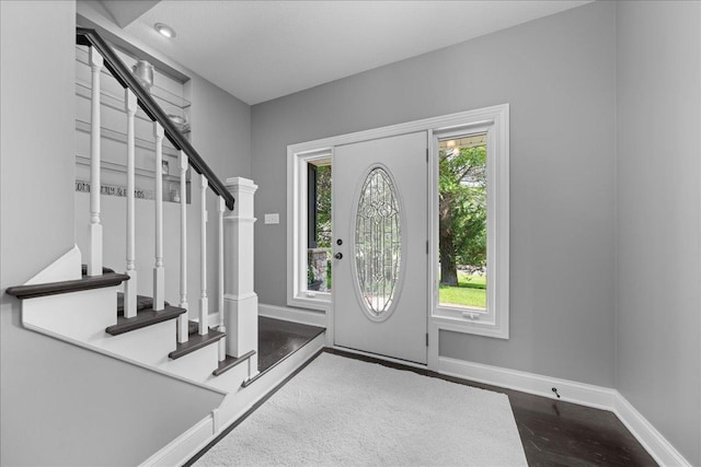 1848 141st Ln NE, Ham Lake, MN 55304 - foyer entrance with healthy amount of natural light, stairway, and wood finished floors