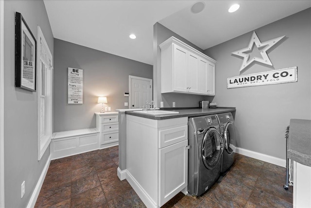 1848 141st Ln NE, Ham Lake, MN 55304 - laundry room with separate washer and dryer, stone finish floors, cabinet space, and recessed lighting