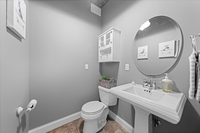 1848 141st Ln NE, Ham Lake, MN 55304 - half bath featuring toilet and baseboards