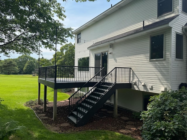 1848 141st Ln NE, Ham Lake, MN 55304 - rear view of property with stairway, a wooden deck, and a yard