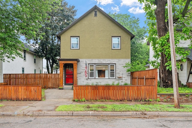 1714 5th St NE, Minneapolis, MN 55413 - view of front of home featuring a fenced front yard