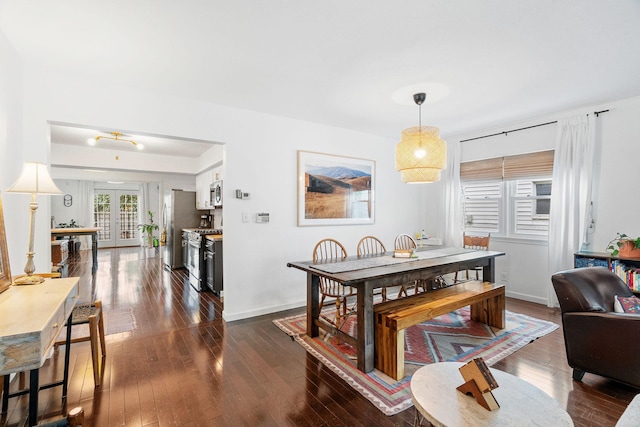 1714 5th St NE, Minneapolis, MN 55413 - dining room with dark wood-style floors and baseboards