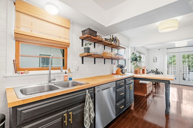 1714 5th St NE, Minneapolis, MN 55413 - kitchen featuring dishwasher, butcher block counters, a sink, dark wood-type flooring, and open shelves
