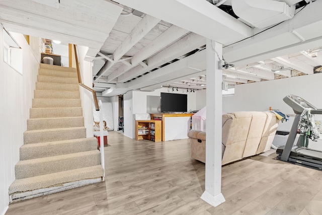 1714 5th St NE, Minneapolis, MN 55413 - finished below grade area featuring stairs and wood finished floors