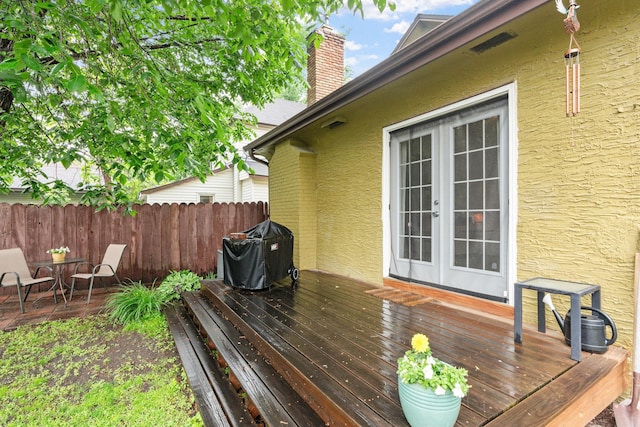 1714 5th St NE, Minneapolis, MN 55413 - wooden terrace with french doors and a grill