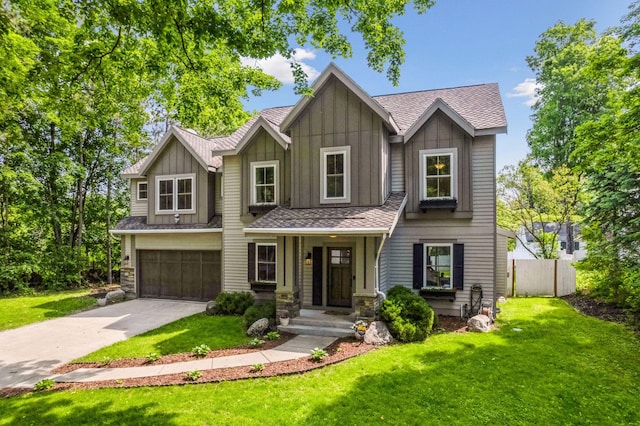 312 Barry Ave N, Wayzata, MN 55391 - craftsman inspired home featuring board and batten siding, an attached garage, driveway, and roof with shingles