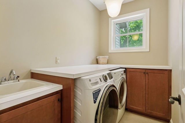 312 Barry Ave N, Wayzata, MN 55391 - washroom featuring cabinet space and washer and dryer