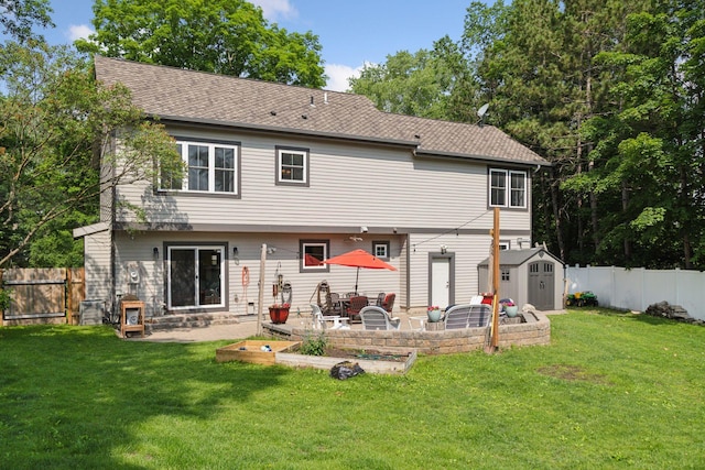 312 Barry Ave N, Wayzata, MN 55391 - back of house with a patio area and roof with shingles