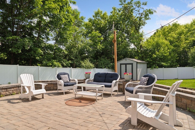 312 Barry Ave N, Wayzata, MN 55391 - fenced backyard with a patio area, an outdoor hangout area, and view of scattered trees
