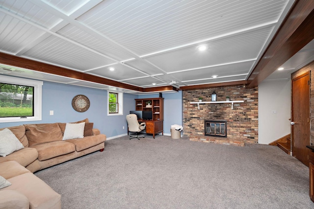 135 Glen Creek Rd NE, Fridley, MN 55432 - carpeted living room with a fireplace, a desk, recessed lighting, and beamed ceiling
