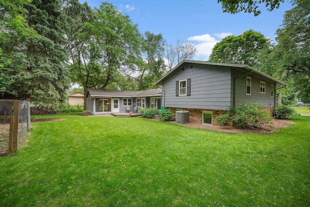 135 Glen Creek Rd NE, Fridley, MN 55432 - rear view of property with a yard, a deck, and brick siding
