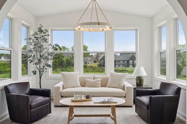 10172 Peony Ln N, Maple Grove, MN 55311 - sunroom / solarium with arched walkways, lofted ceiling, and a chandelier